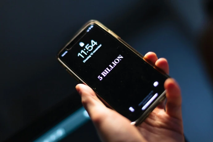 black smartphone at 10 00
